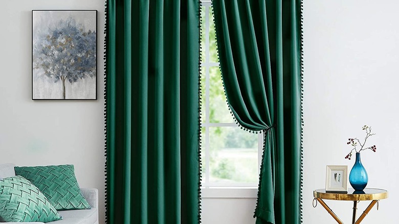 Green curtains and painting