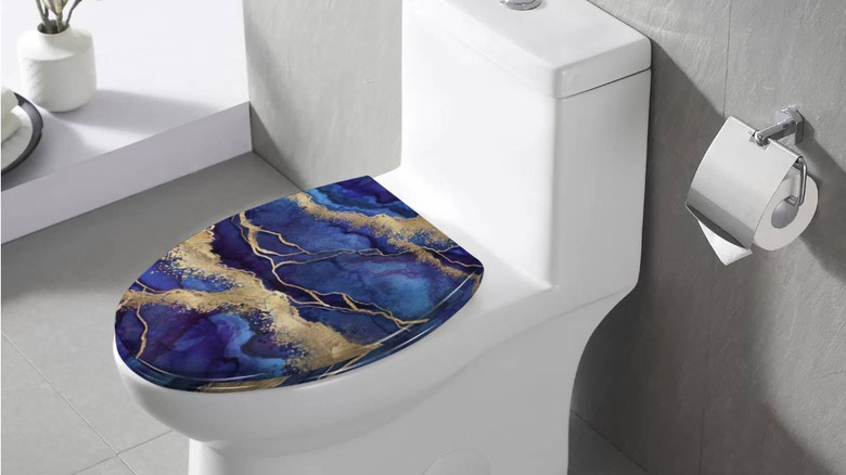 Blue and gold marbled toilet seat