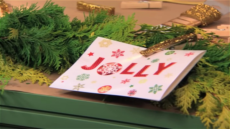 Christmas card pinned to garland