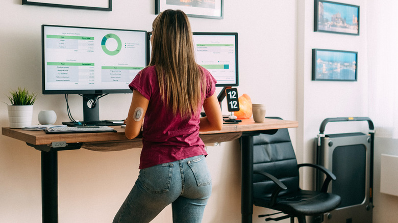 woman working at standing desk