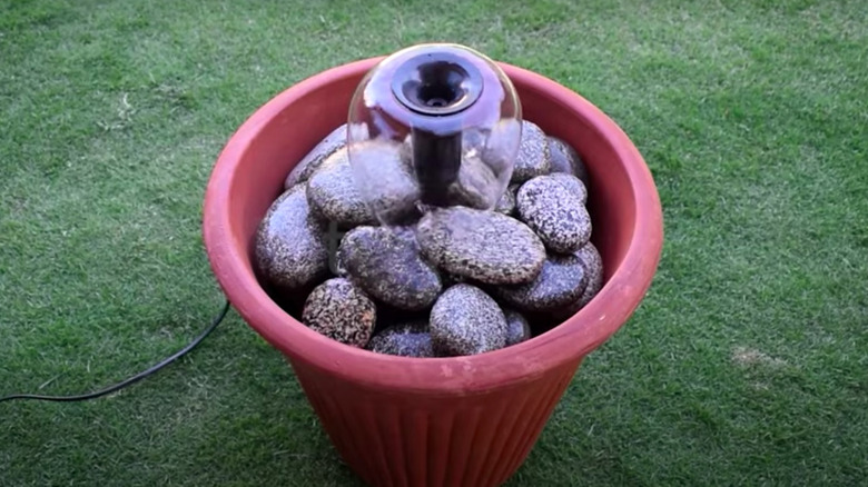 DIY water fountain with rocks