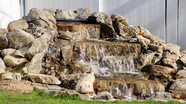 rocky waterfall backyard