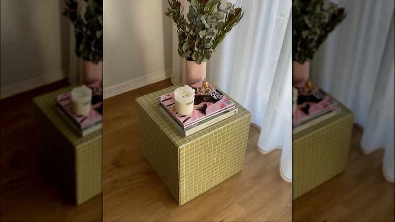 Cube table covered in mosaic tiles