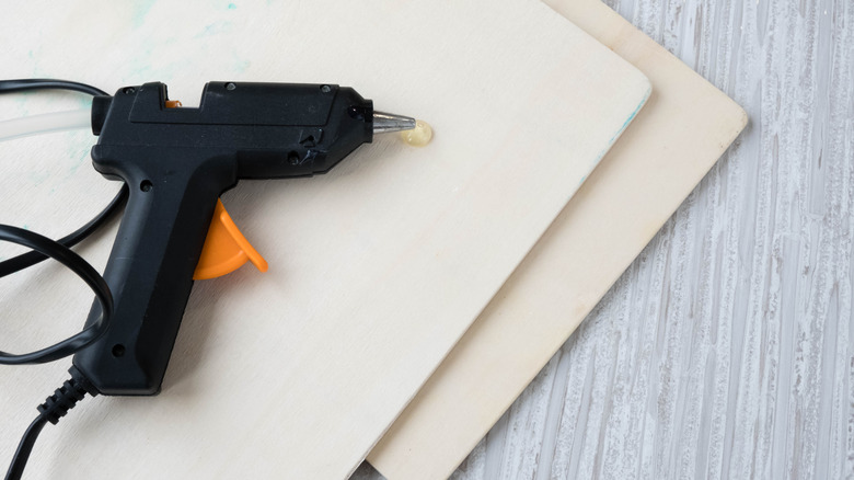 Hot glue gun on table