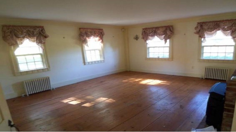 living room with hardwood floors and windows 