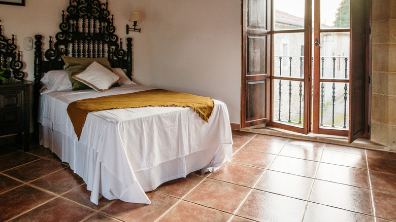 Spanish bedroom with tile floors