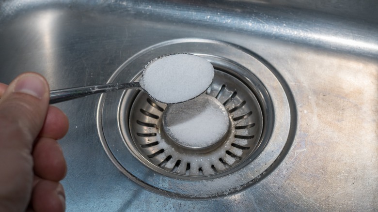 Putting salt in sink drain