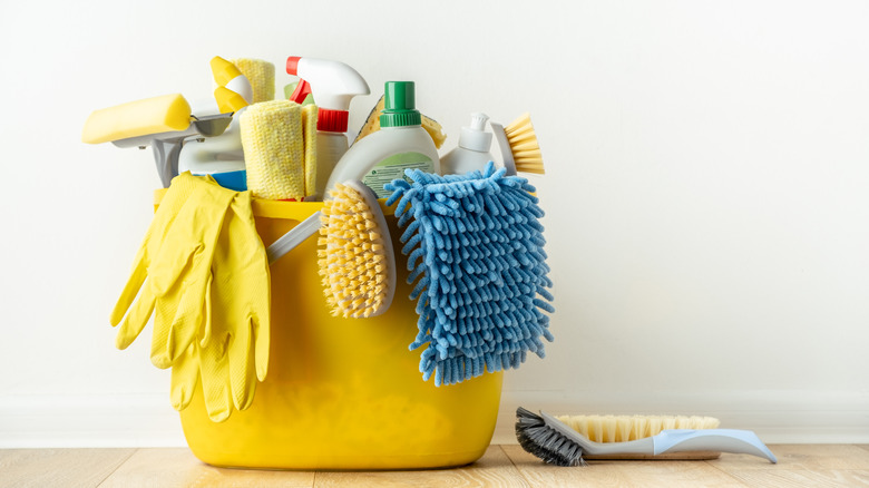 Cleaning products in bucket