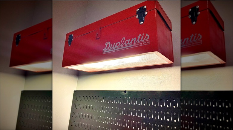 red metal toolbox wall light