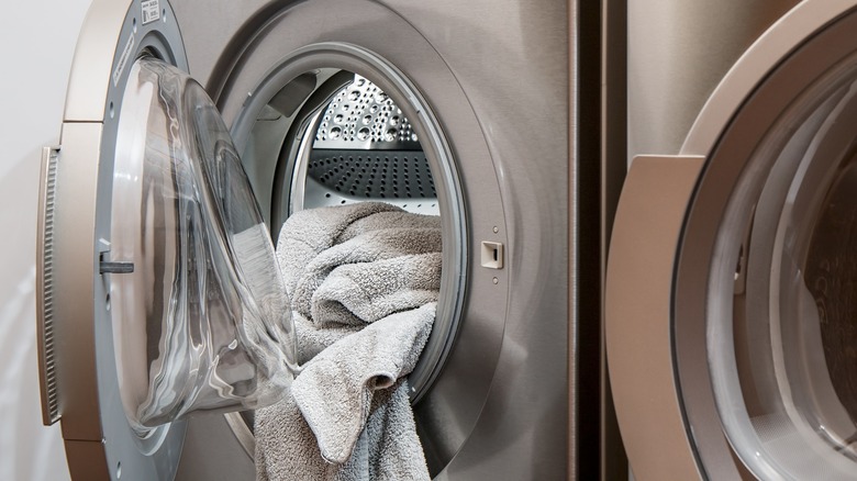 beige towel in front-load dryer