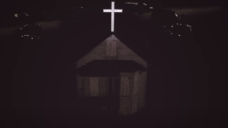 home with cross on top