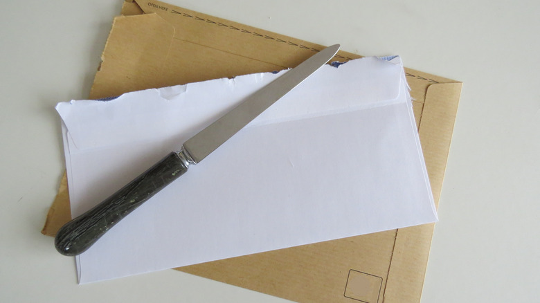 letter opener on white envelope