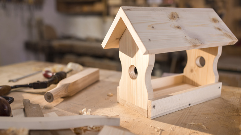 wooden birdhouse in construction