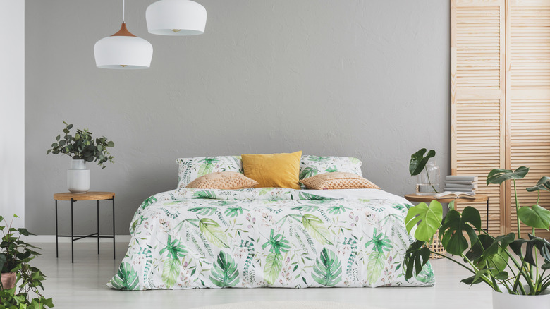 white and blue floral bedspread