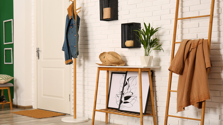 entryway blanket ladder with jacket