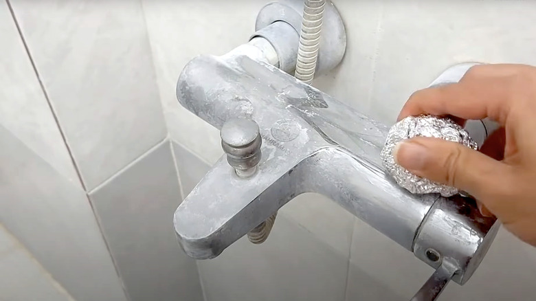 scrubbing tub and shower faucet with foil ball