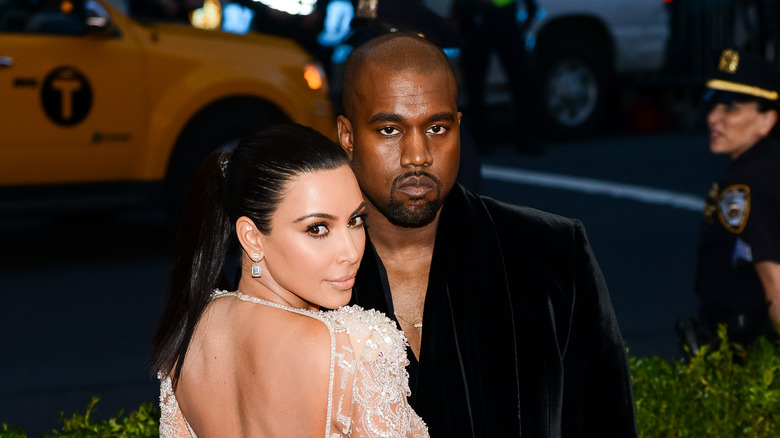 kim kardashian and kanye west looking serious