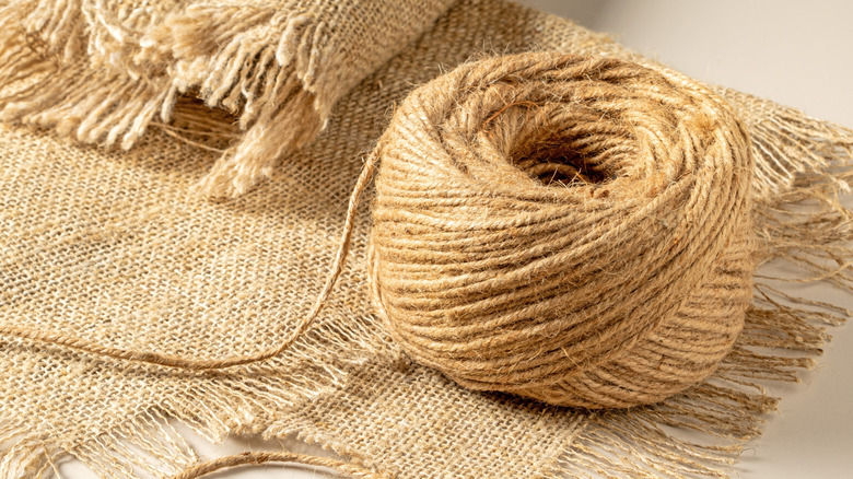 ball of jute string on a woven jute mat