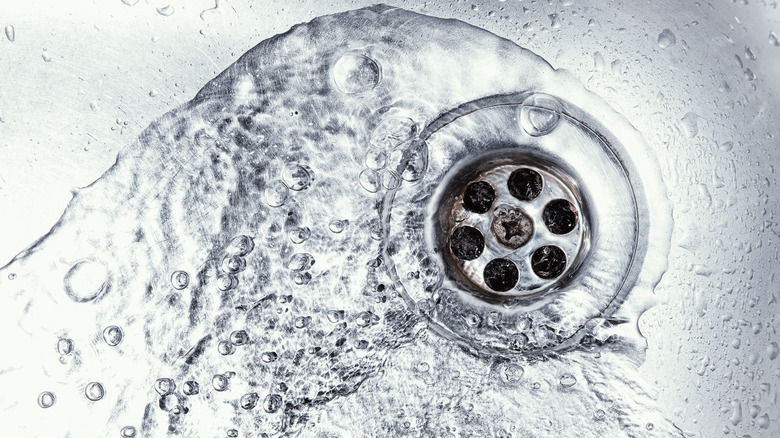 Empty and clean sink