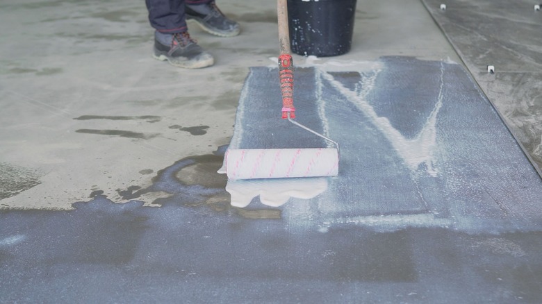 Applying sealant to concrete