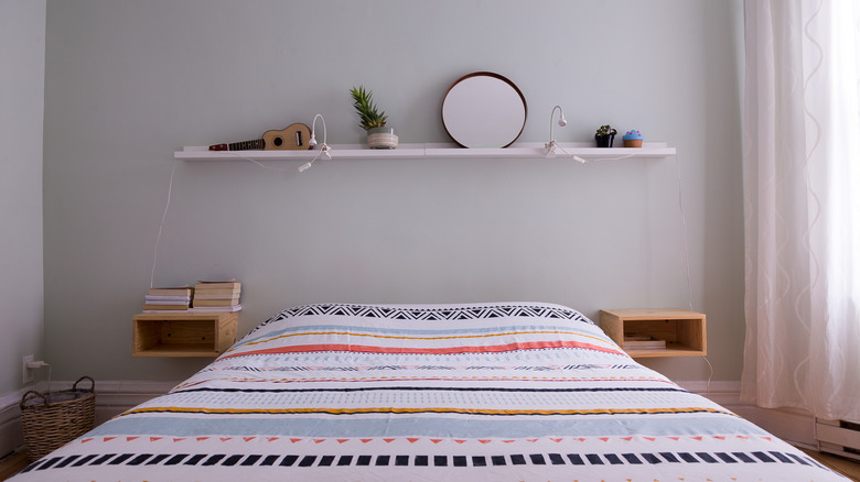 Bedroom with floating shelf