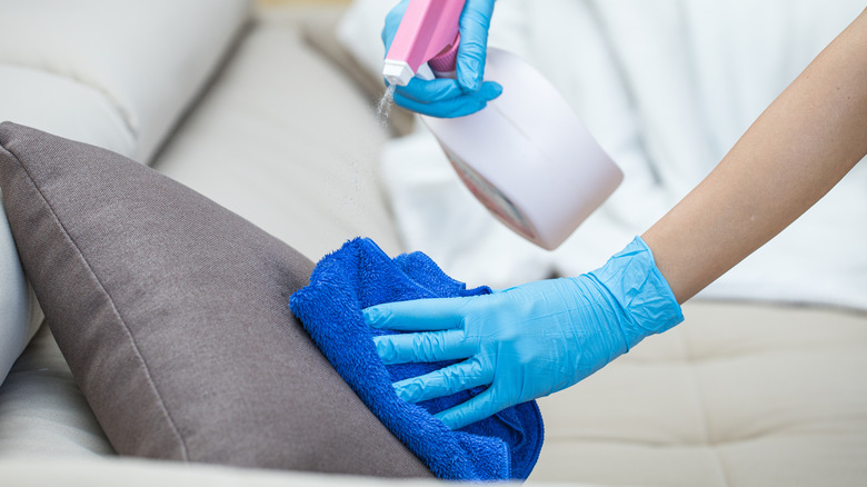 Person hand washing a pillow