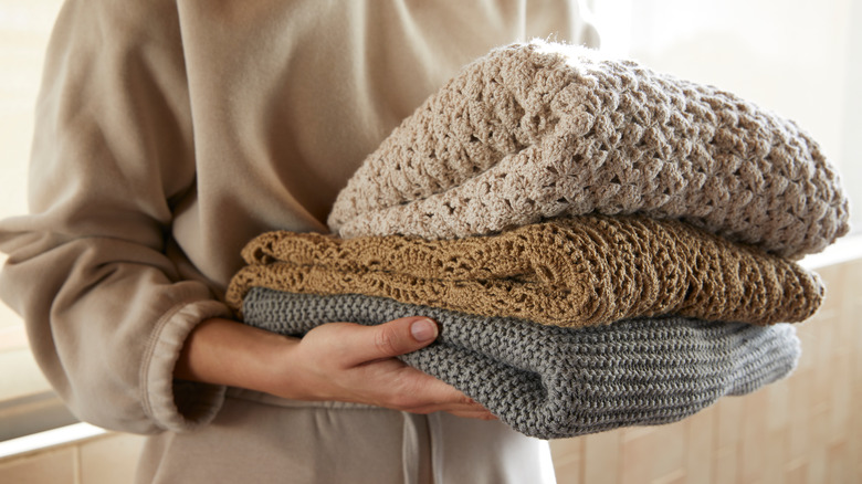 Woman folding clothes