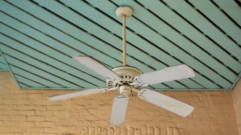 old white ceiling fan on patio