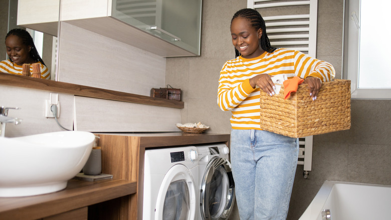 woman cleaning laundry room