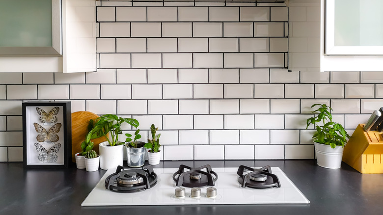 Tiled backsplash in kitchen