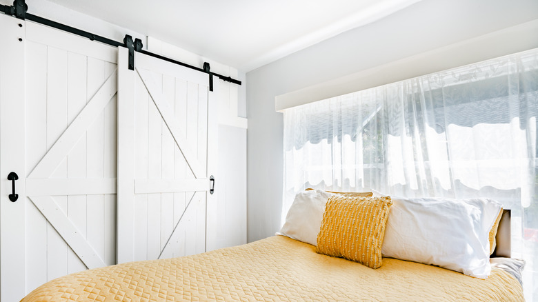 white barn doors in bedroom