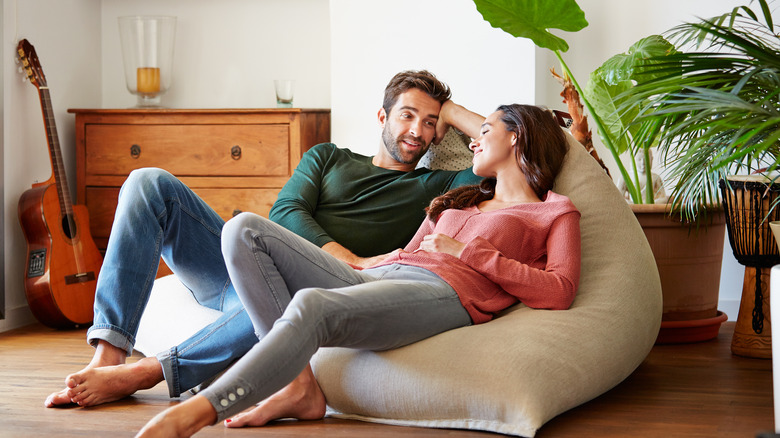 Couple on bean bag chair