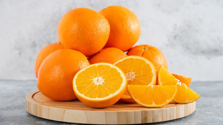 oranges on cutting board