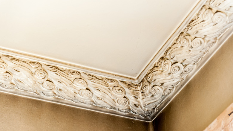 plasterwork on room's ceiling