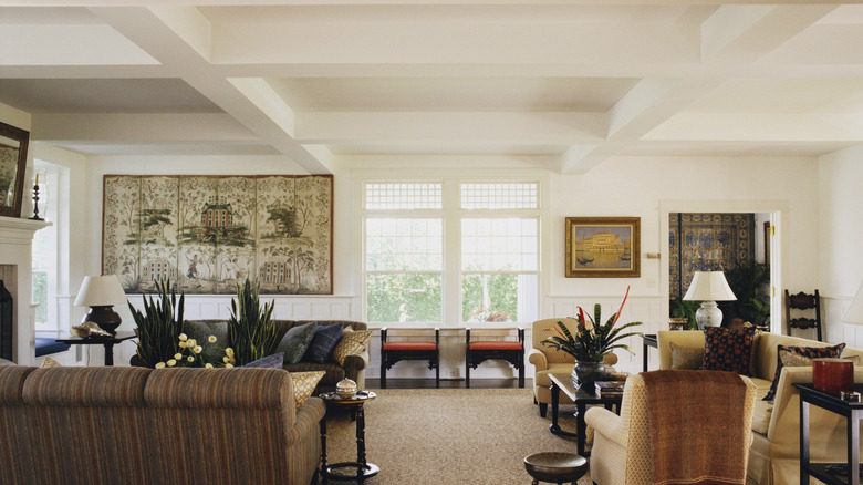 living room with white coffered ceilings