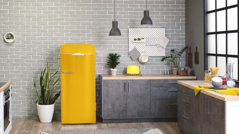 Yellow fridge in kitchen 