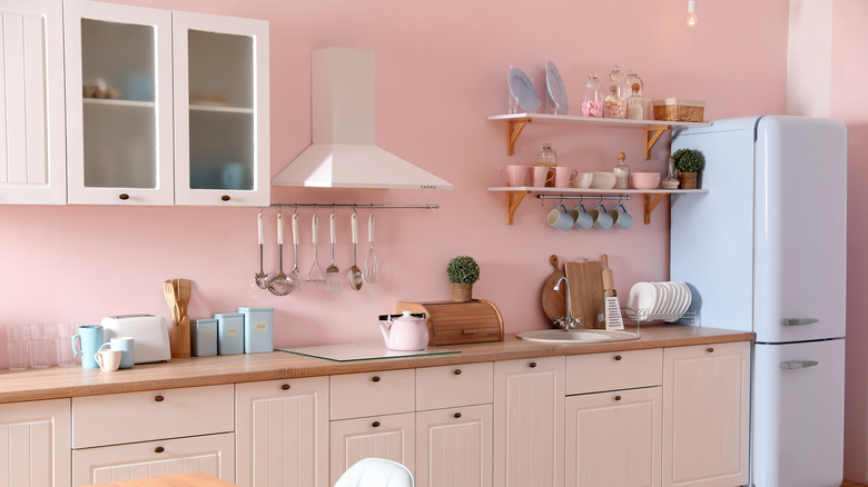 Cream fridge in pink kitchen 