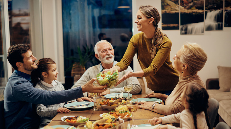 Family eating dinner together