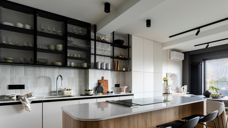 kitchen with glass-front upper cabinets