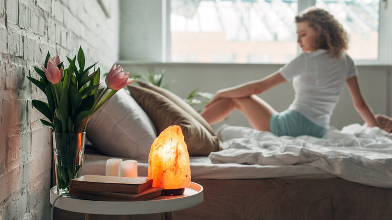 salt lamp on bedside table