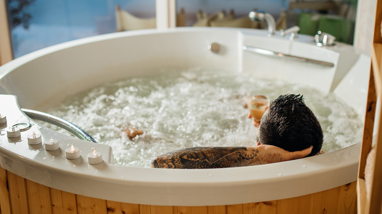 man in hot tub