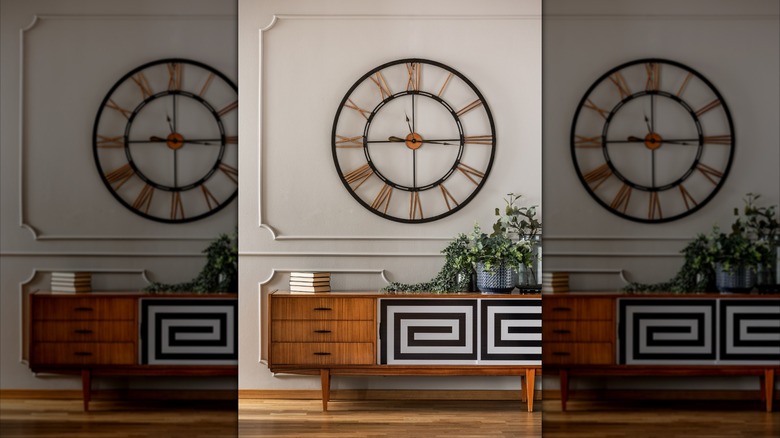 Oversized clock hanging on wall in a living room