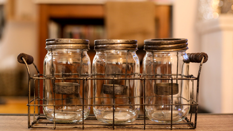 https://www.housedigest.com/img/gallery/are-mason-jars-as-home-decor-going-out-of-style/intro-1660745763.jpg