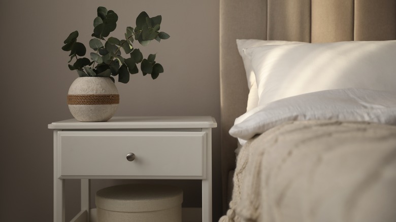 white nightstand in bedroom