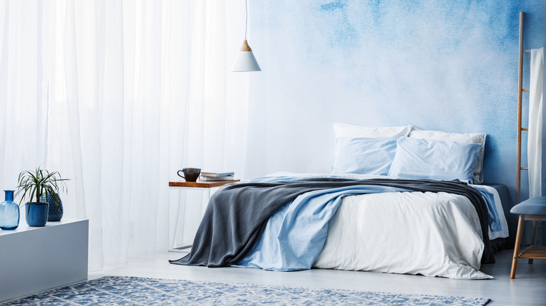 pastel blue and white bedroom