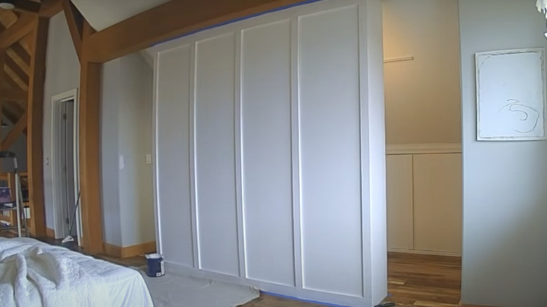 partition added in-between closet and bedroom