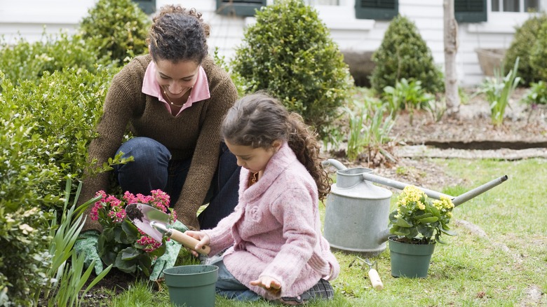 woman and child in garden