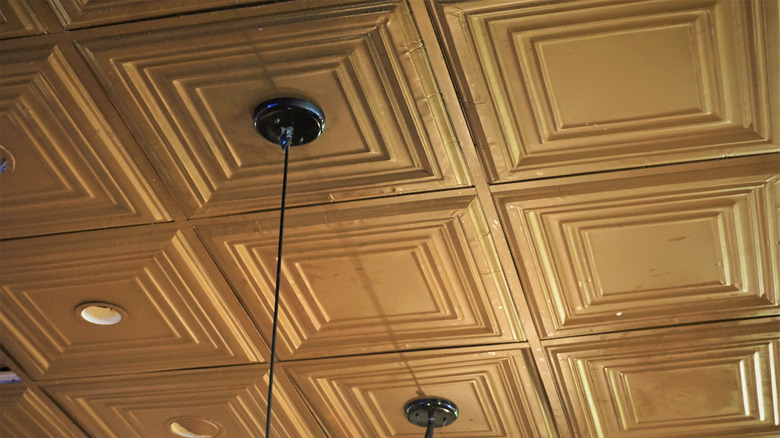 Geometric gold tin ceiling