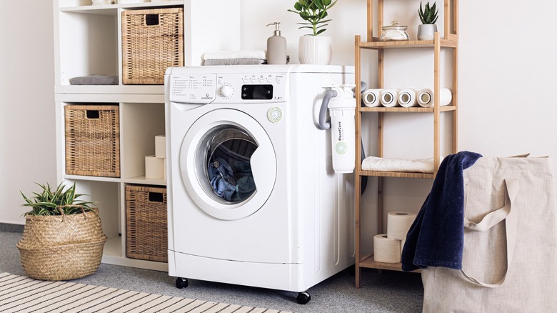 White washing machine laundry room