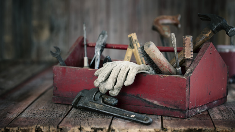 An old tool box with tools